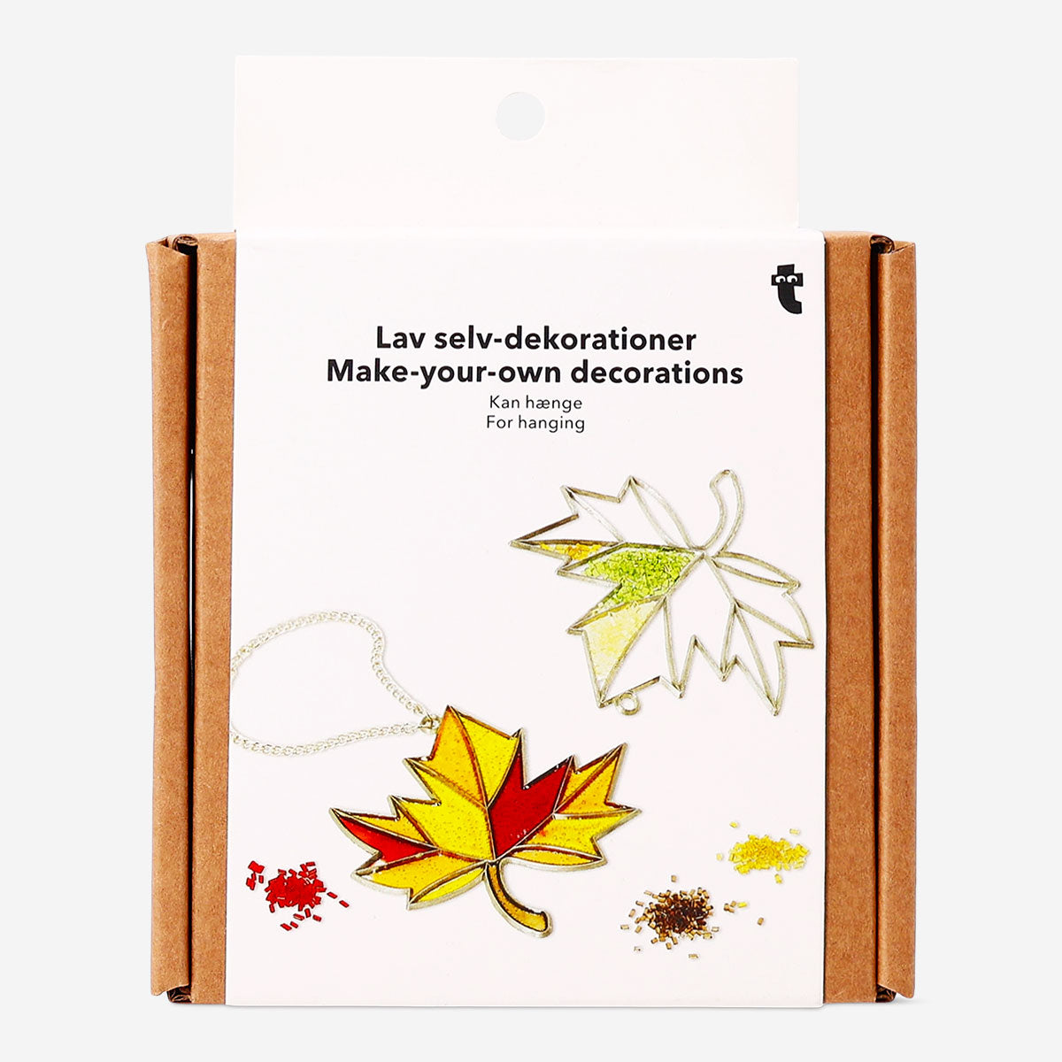 Two DIY stained glass autumn leaves decorations for hanging, colorful hobby craft by Flying Tiger Copenhagen.