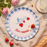 Decorative round metal tray from Flying Tiger Copenhagen, 31 cm diameter, featuring a stylish design for home decor.