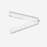 Regla plegable transparente