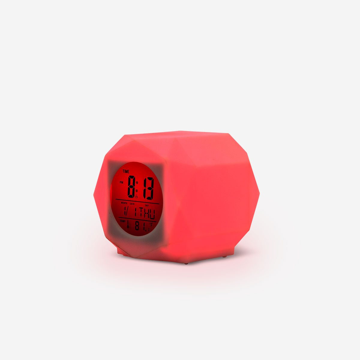 Digital alarm clock by Flying Tiger Copenhagen with color-changing LED display showing time and modern gadget design.