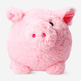 Pink plush piggy bank toy from Flying Tiger Copenhagen featuring a soft, cute pig design for saving coins.