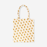 Textile tote bag featuring gingerbread people design from Flying Tiger Copenhagen, with colorful holiday-themed print.