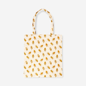 Textile tote bag featuring gingerbread people design from Flying Tiger Copenhagen, with colorful holiday-themed print.