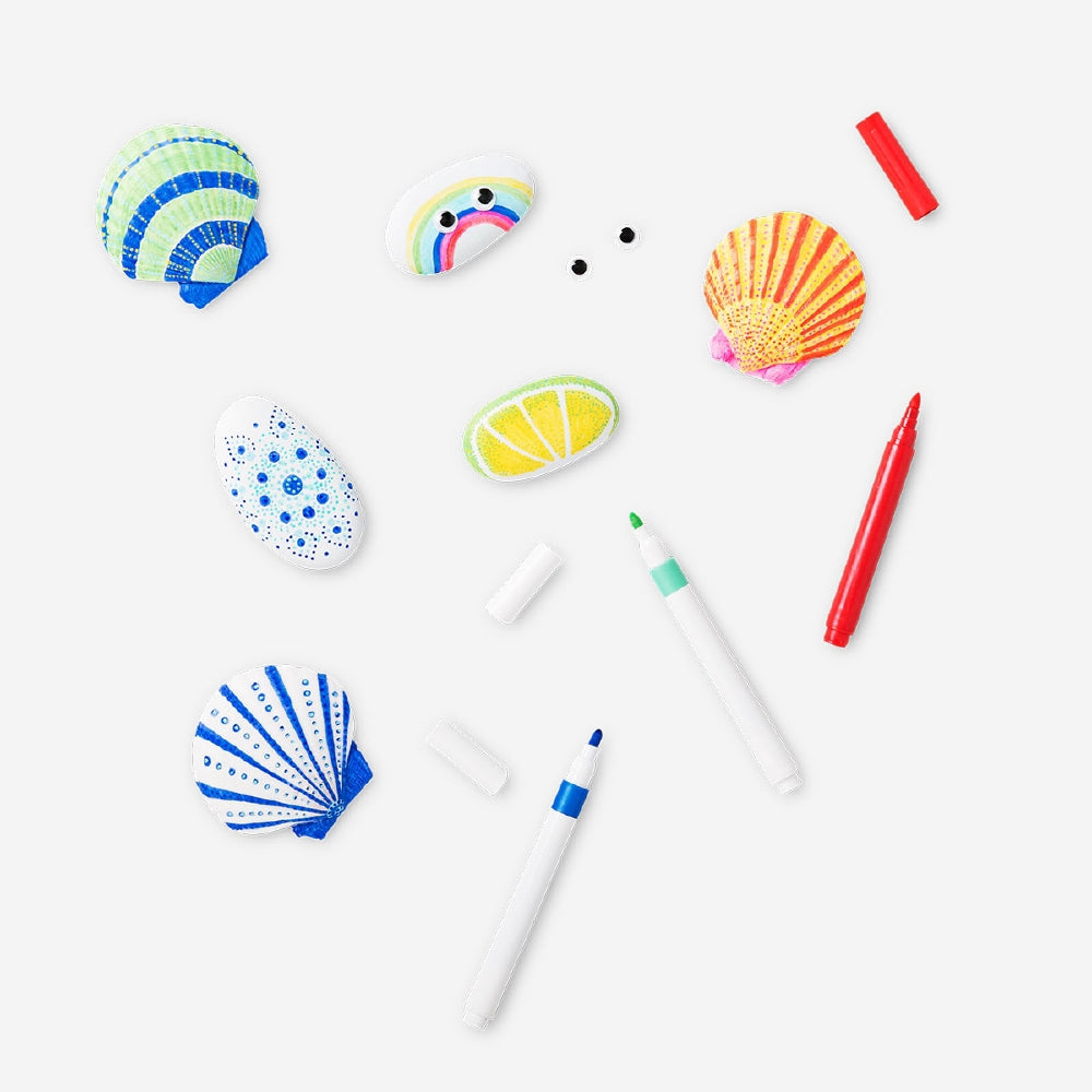 Hobby rock and shell decorating kit from Flying Tiger Copenhagen with colorful stones and shells for creative crafts.