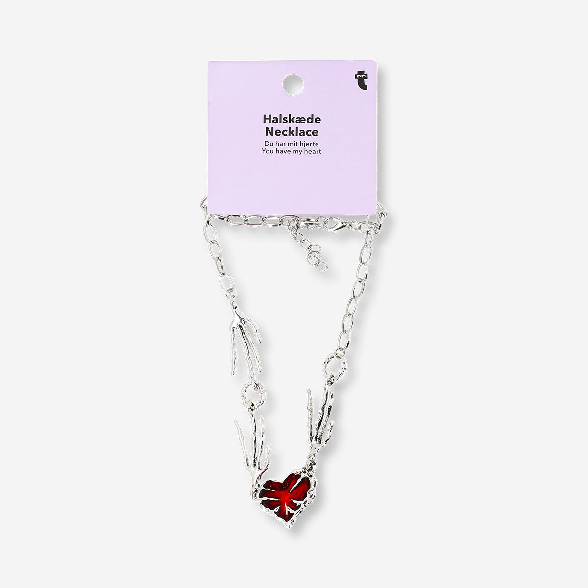 Silver textile necklace featuring a red heart pendant, stylish jewelry accessory by Flying Tiger Copenhagen.