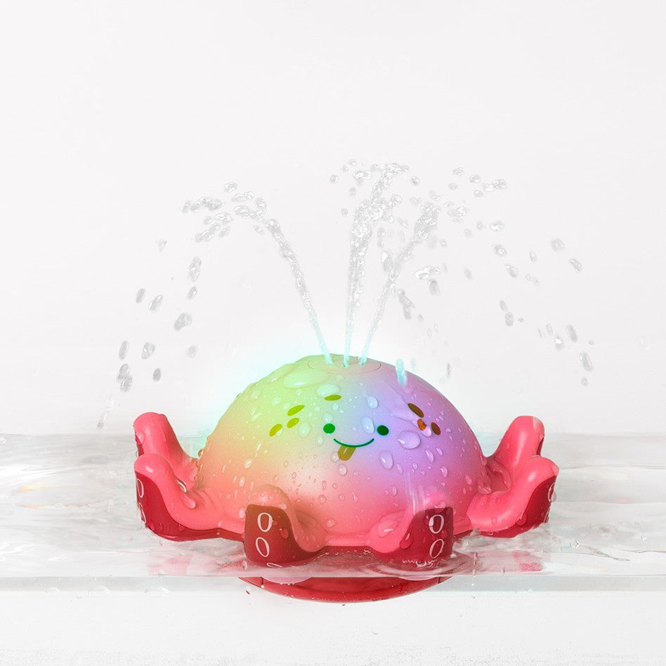 Flying Tiger Copenhagen water spraying octopus gadget with colorful changing lights, designed for fun and decorative play.