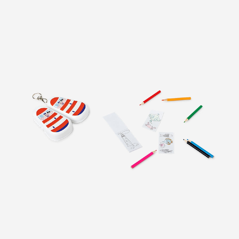 Mini coloured pencils set with a colouring book by Flying Tiger Copenhagen, featuring vibrant pencils and a fun, illustrated colouring page.