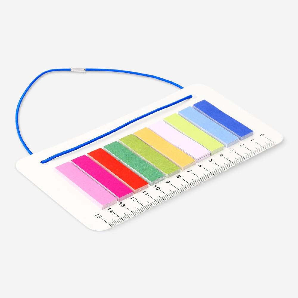 Flying Tiger Copenhagen office ruler with elastic band and page markers, featuring clear measurement markings.