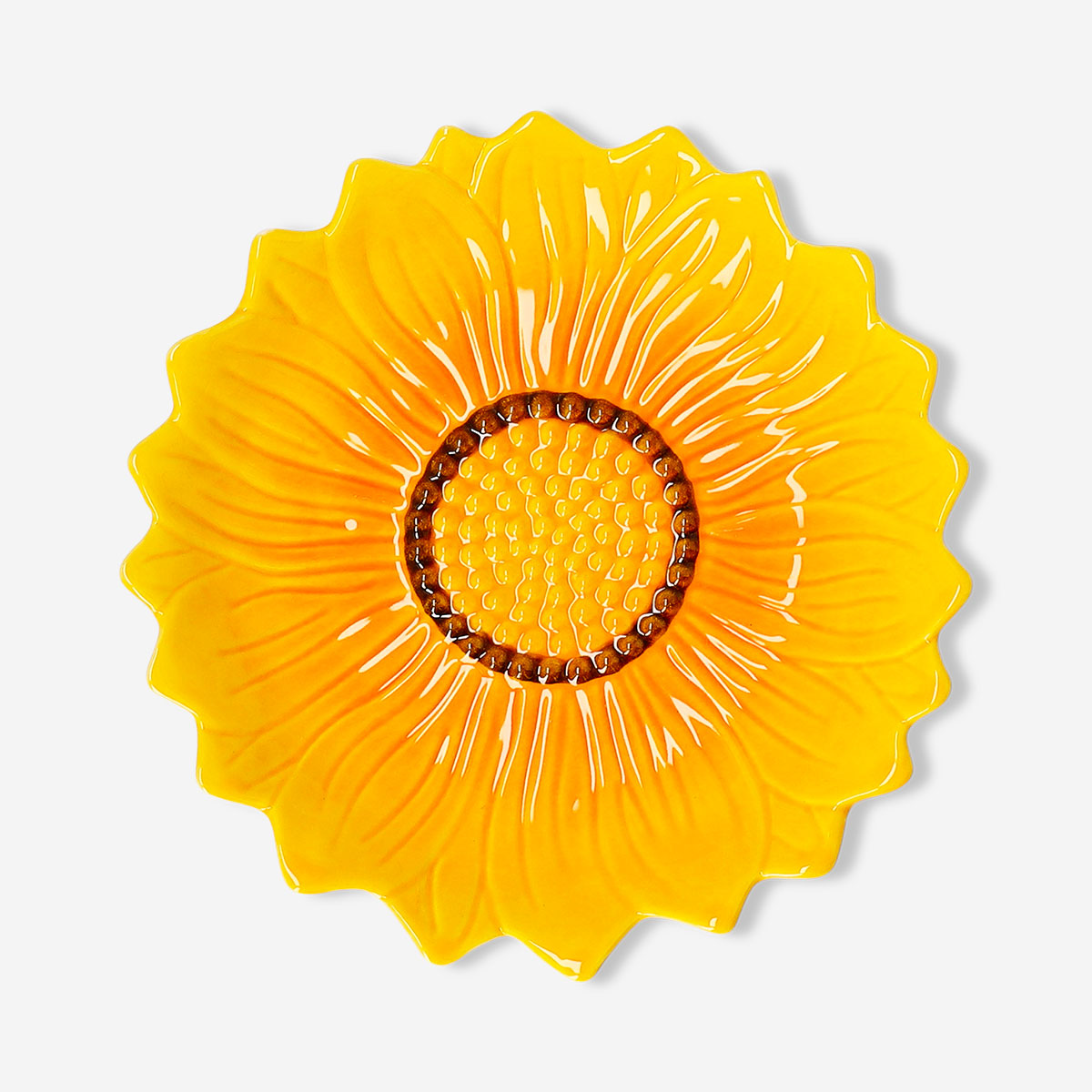 Round 20 cm ceramic plate featuring embossed sunflower design, ideal for kitchen use, by Flying Tiger Copenhagen.
