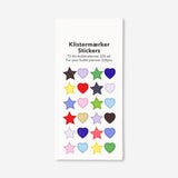 Flying Tiger Copenhagen star and heart stickers for office decor, featuring colorful designs on a white background.