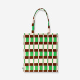 Multi-colored striped textile tote bag by Flying Tiger Copenhagen, featuring vibrant fabric and sturdy handles.