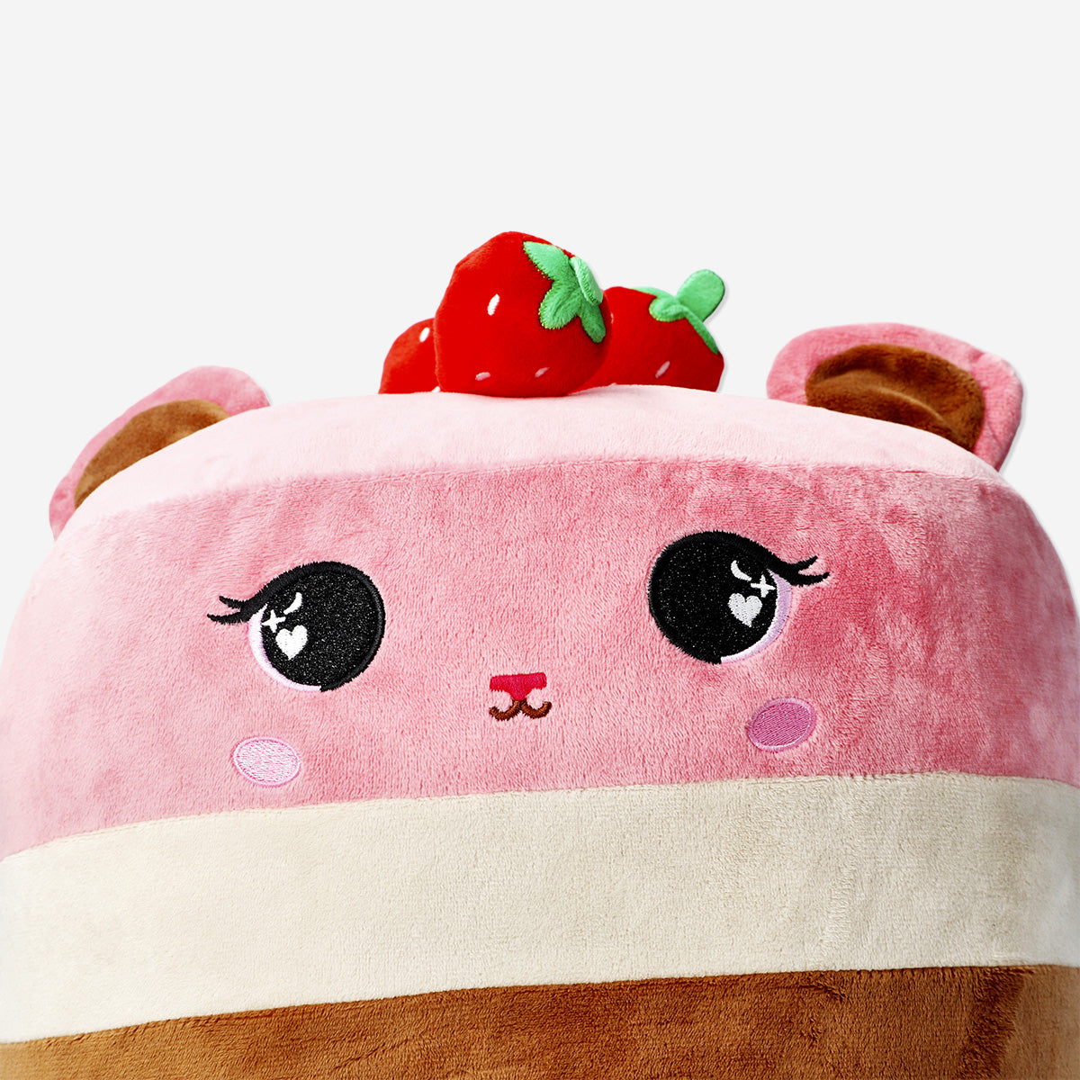 Peluche de gato en forma de pastel de fresa