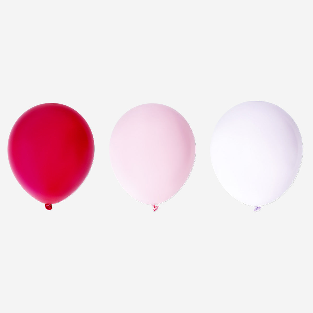 Assorted metallic rose-colored balloons for party decoration, featuring a mix of shiny, reflective balloons from Flying Tiger Copenhagen.