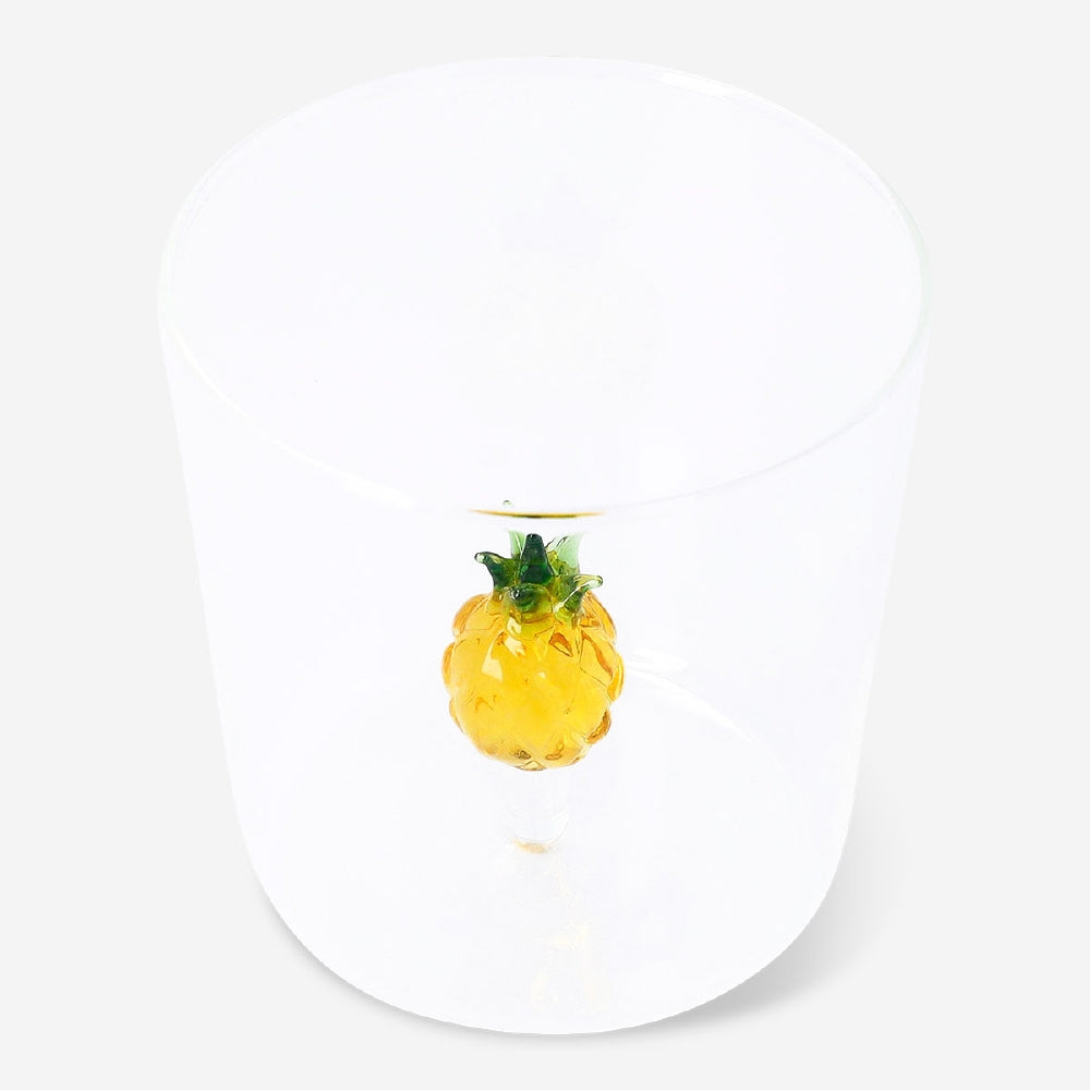 Clear 350ml drinking glass with pineapple-shaped design, branded by Flying Tiger Copenhagen, perfect for tropical-themed drinks.