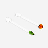 Set of two glass kitchen spoons with decorative pumpkin toppers, perfect for seasonal cooking and serving.