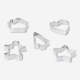 Set of five Flying Tiger Copenhagen kitchen cookie cutters in various shapes for baking and decorating cookies.