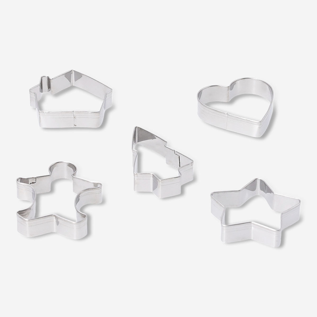 Set of five Flying Tiger Copenhagen kitchen cookie cutters in various shapes for baking and decorating cookies.