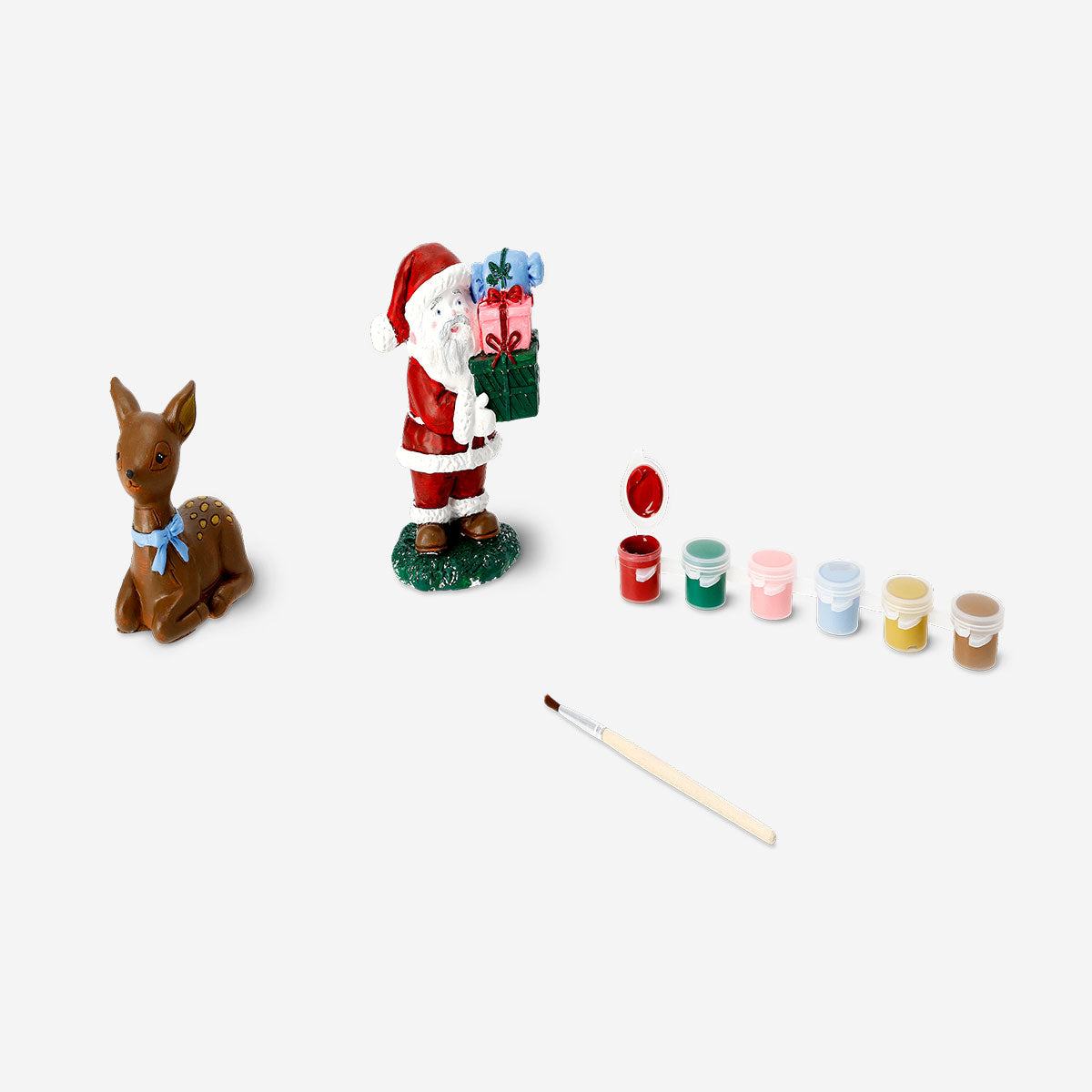 DIY plaster Christmas figures hobby kit from Flying Tiger Copenhagen, featuring unpainted festive holiday shapes for craft projects.