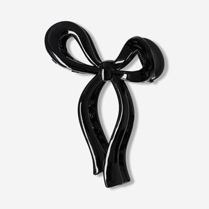 Black textile bow hairclip with a sleek design, perfect for styling hair and adding a touch of elegance.