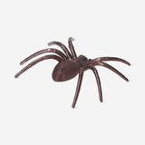 Six decorative metallic spiders for party decor by Flying Tiger Copenhagen, featuring shiny silver finishes and intricate details.