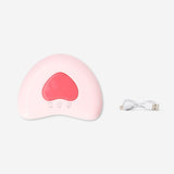Flying Tiger Copenhagen Heart UV nail lamp for gel polish, personal care device with heart-shaped design for at-home manicures.