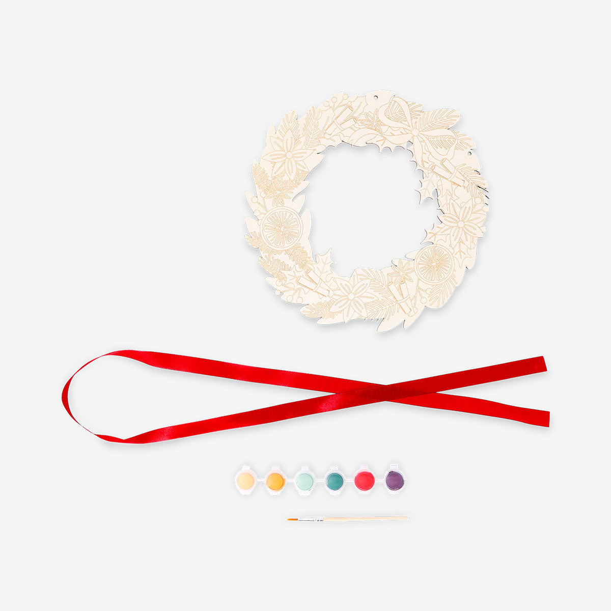 DIY wooden wreath hobby craft by Flying Tiger Copenhagen, showcasing a circular wooden frame with craft supplies.