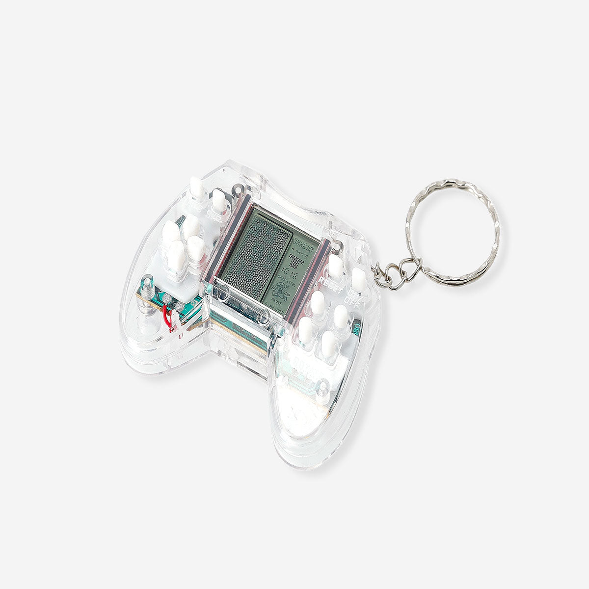 Flying Tiger Copenhagen keyring gadget featuring a game machine with multiple game icons in bright, playful colors.