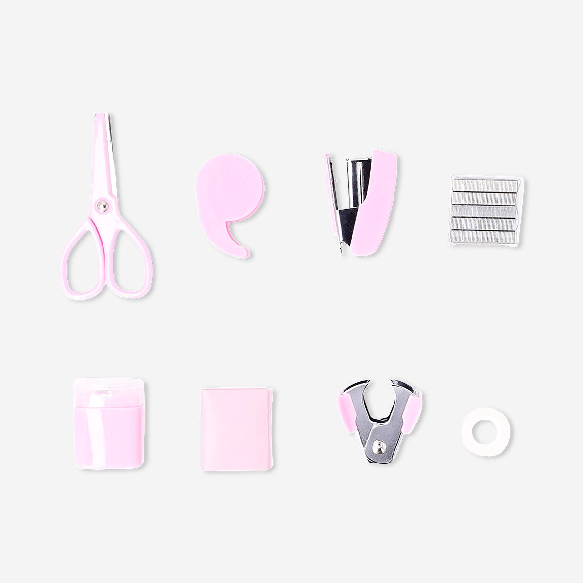 Pink Flying Tiger Copenhagen stationery kit with pens, notebooks, and office supplies arranged on a desk.