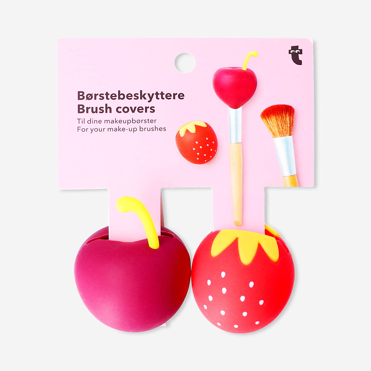 Two berry-shaped makeup brush covers in vibrant red and green, designed to protect and store makeup brushes.