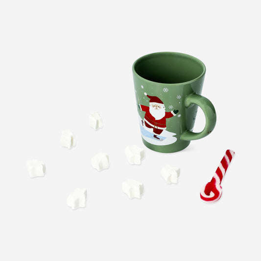 Mug with hot chocolate and candy cane spoon