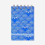 Blue spiral notepad with cat print, ideal for office use, by Flying Tiger Copenhagen.