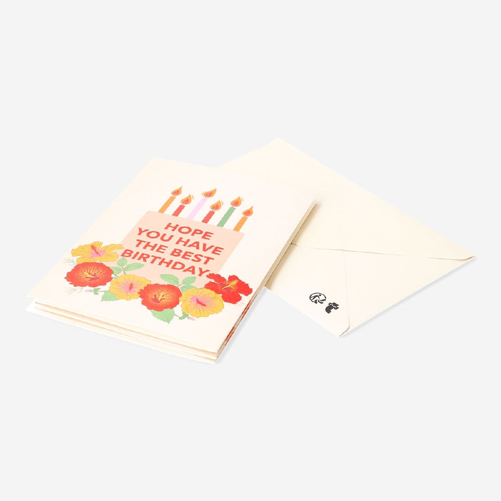 Fold-out birthday candles office greeting card by Flying Tiger Copenhagen, featuring colorful candle illustrations on a festive card.