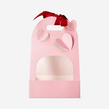 Pink gift basket with ribbon