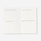 Write-and-burn office journal by Flying Tiger Copenhagen with blank pages and simple cover design for note-taking and creative writing.