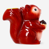 Decorative squirrel candle holder from Flying Tiger Copenhagen, 11 cm tall, made of ceramic with a detailed squirrel design.