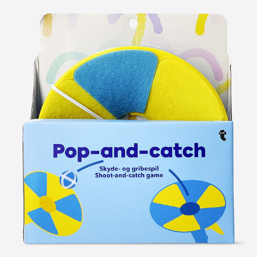 Flying Tiger Copenhagen shoot and catch game set featuring colorful plastic paddles and ball for active outdoor play.