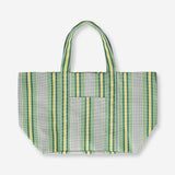 Green mesh shopper bag with striped textile design by Flying Tiger Copenhagen, featuring eco-friendly reusable material.