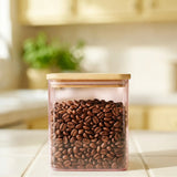 Pink glass storage container with lid from Flying Tiger Copenhagen, 1.1 L kitchen storage solution with a sleek design.