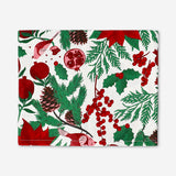 Festive Christmas tablecloth with holly and poinsettia print from Flying Tiger Copenhagen, measuring 140x220 cm.