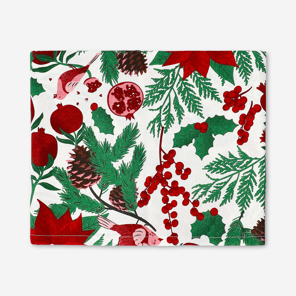 Festive Christmas tablecloth with holly and poinsettia print from Flying Tiger Copenhagen, measuring 140x220 cm.