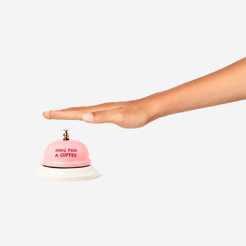 Flying Tiger Copenhagen Bell Ring for Coffee gadget, small metal bell with a black ring, designed to signal coffee breaks.