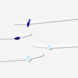 Four glass straws with fish and seashell decorations from Flying Tiger Copenhagen, featuring colorful ocean-themed designs.