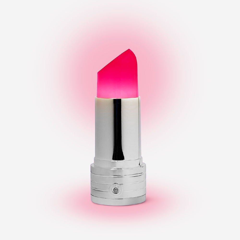 Flying Tiger Copenhagen lipstick-shaped cosy lamp inspired by RuPaul's Drag Race, perfect for home decor and ambient lighting.