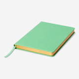 Green A5 bullet planner from Flying Tiger Copenhagen, designed for office organization and note-taking.