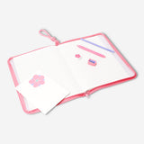 Assorted floral stationery kit with notebooks, pens, and stickers from Flying Tiger Copenhagen for office or school use.