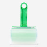 Reusable lint remover from Flying Tiger Copenhagen, showing the compact home cleaning tool with a textured surface.