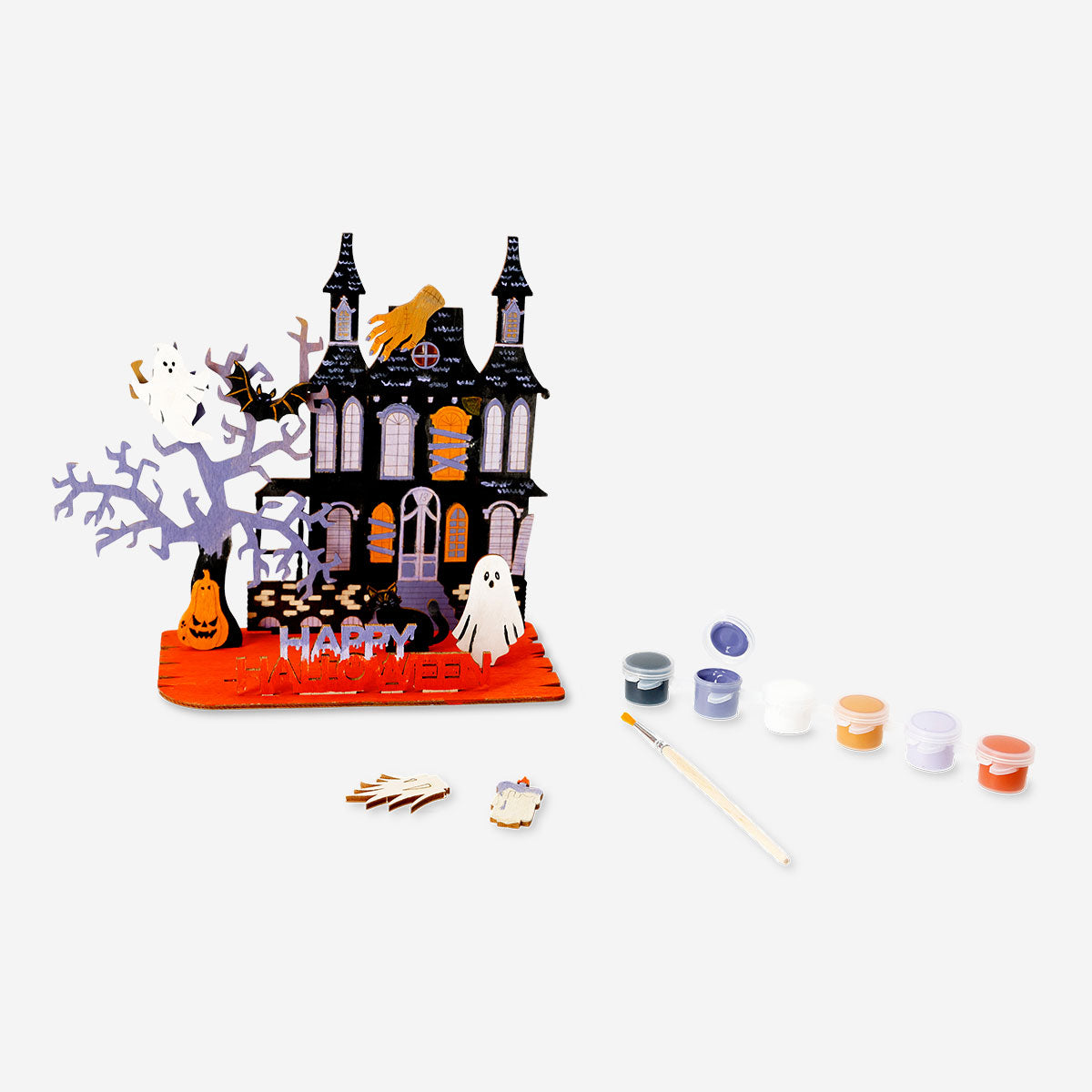 DIY haunted house craft with paint and brush, designed for hobby enthusiasts by Flying Tiger Copenhagen.