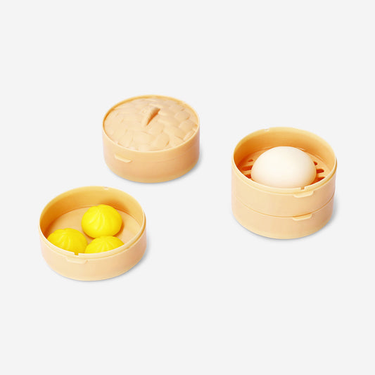 Candy dumplings in steamer basket