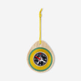Wooden toy compass from Flying Tiger Copenhagen showing a detailed, colorful compass design on a smooth wooden surface.