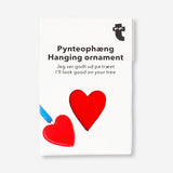 Red ceramic heart hanging ornament for home decor, featuring a vibrant, glossy finish and a string for hanging from Flying Tiger Copenhagen.